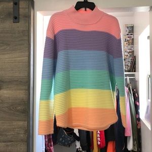 It’s a UNIF colorful Rainbow sweater